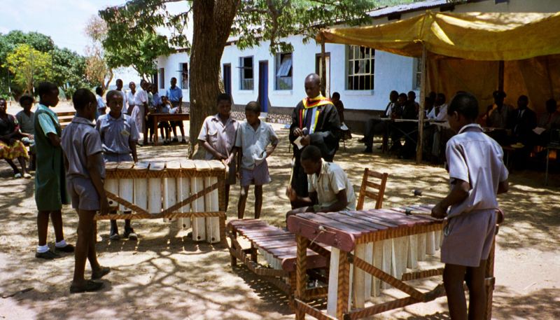 A school marimba band playing outdoors